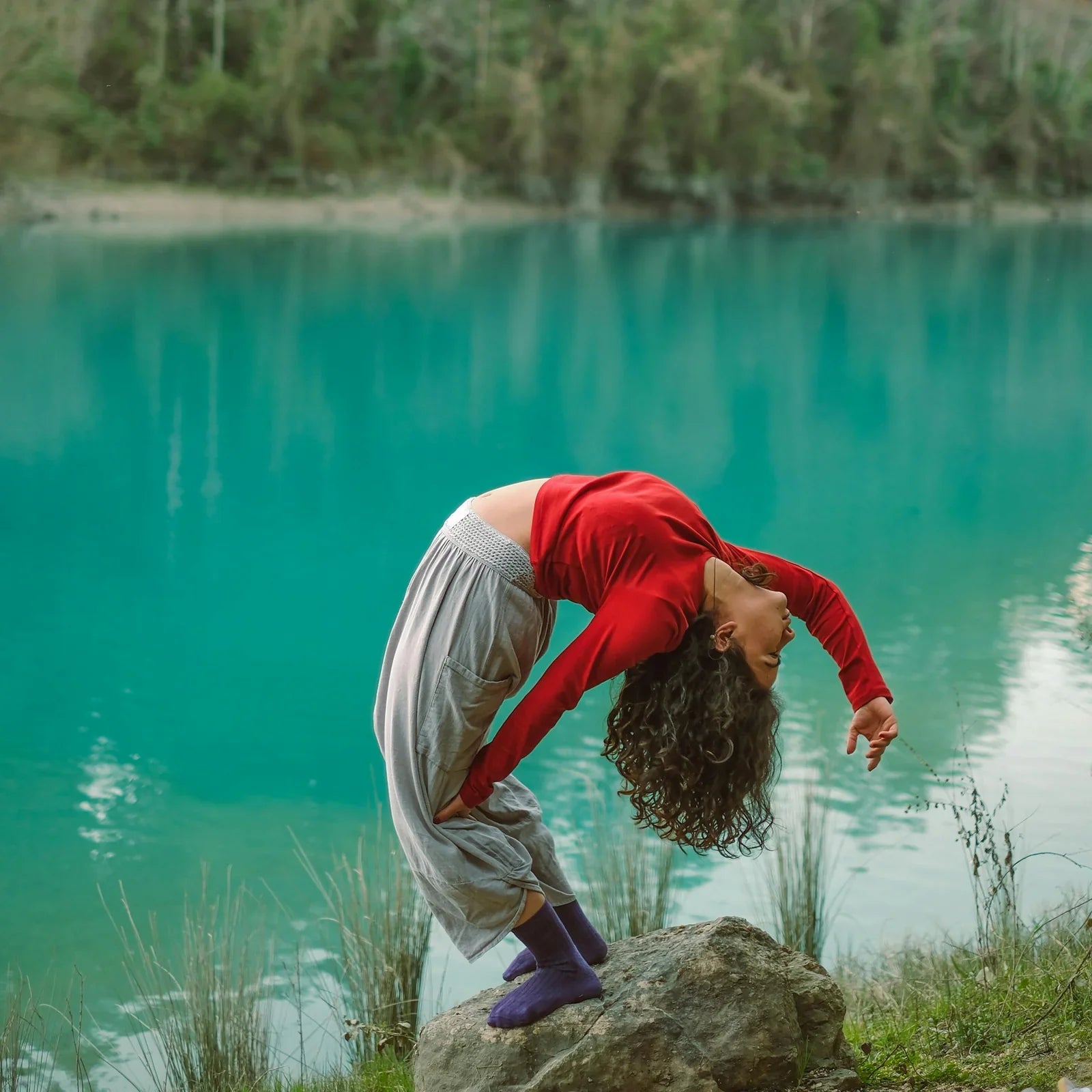 SUP Yoga Girl Next To Water
