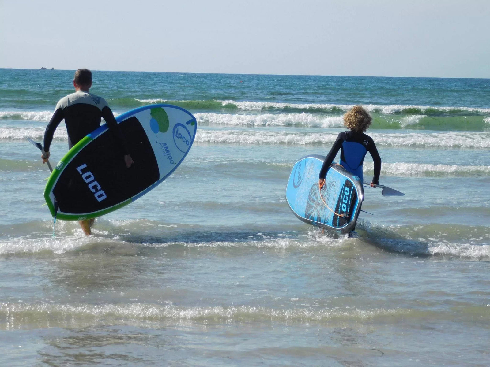 father and son paddle surfing, Loco SUP Surfing South West Portugal | Loco Surfing