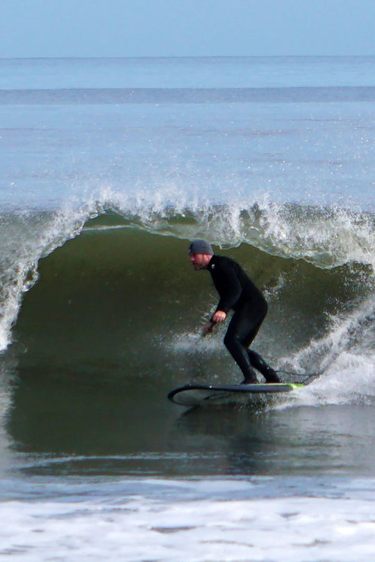 Greg avoids the lip on his surfing paddle board