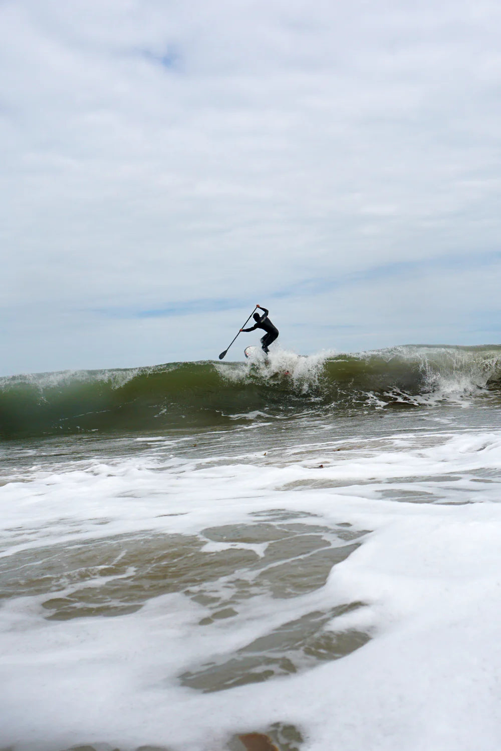 Will avoids a wipeout on his surf SUP