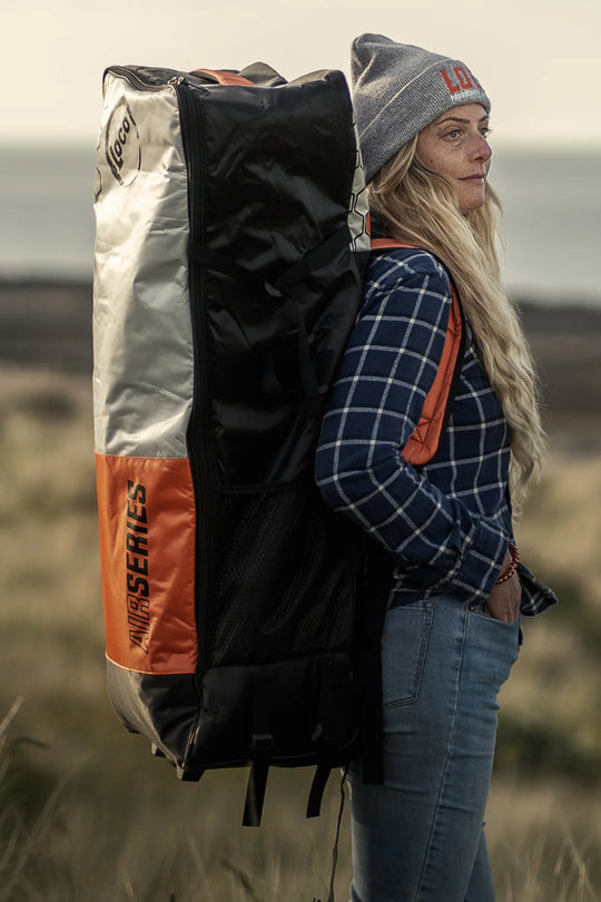 Woman Carrying Loco in the bag