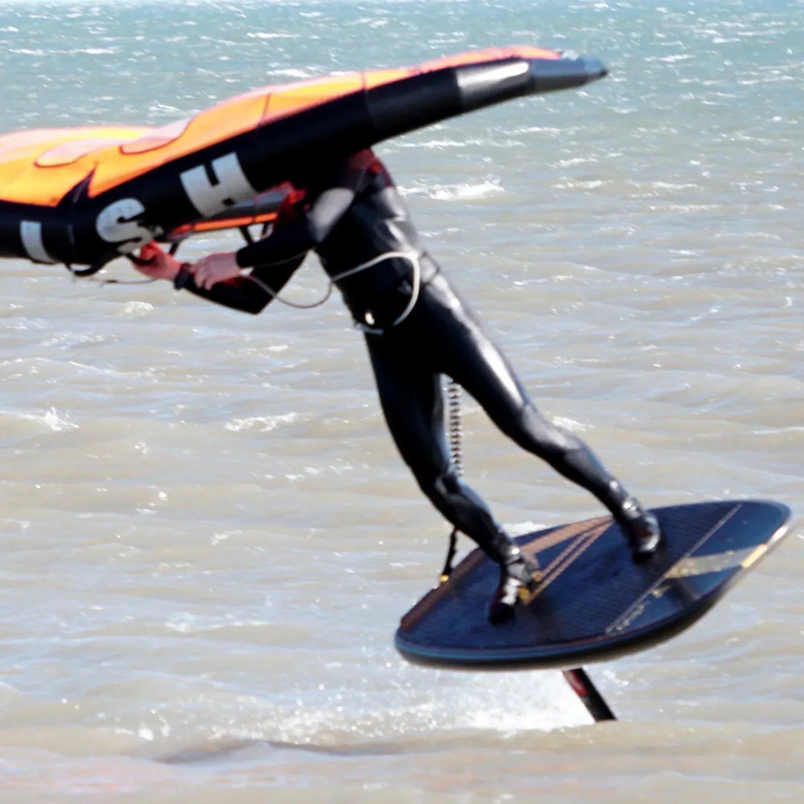 guy wing foiling on his Loco foil board