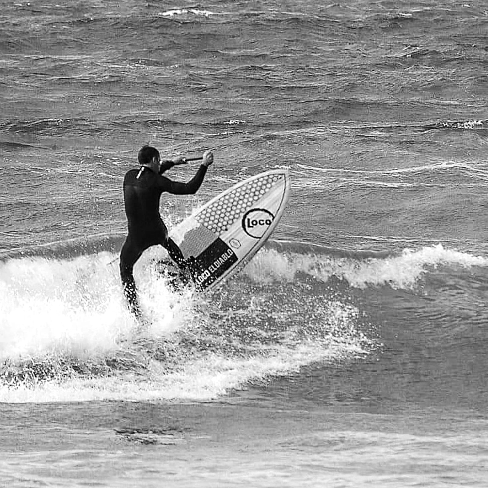 Jamie hits the lip on his surf SUP