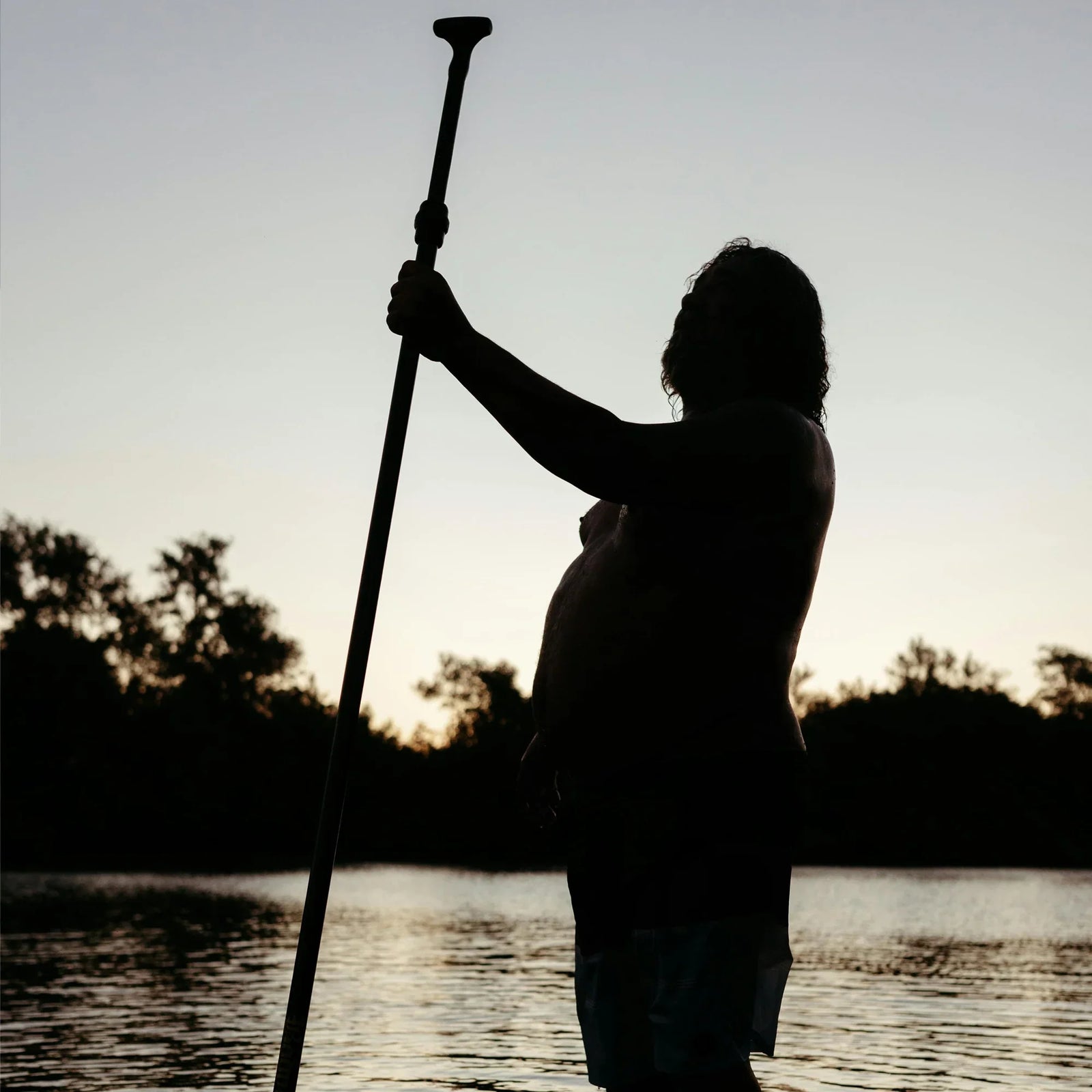 Big guy about to ride his SUP Board