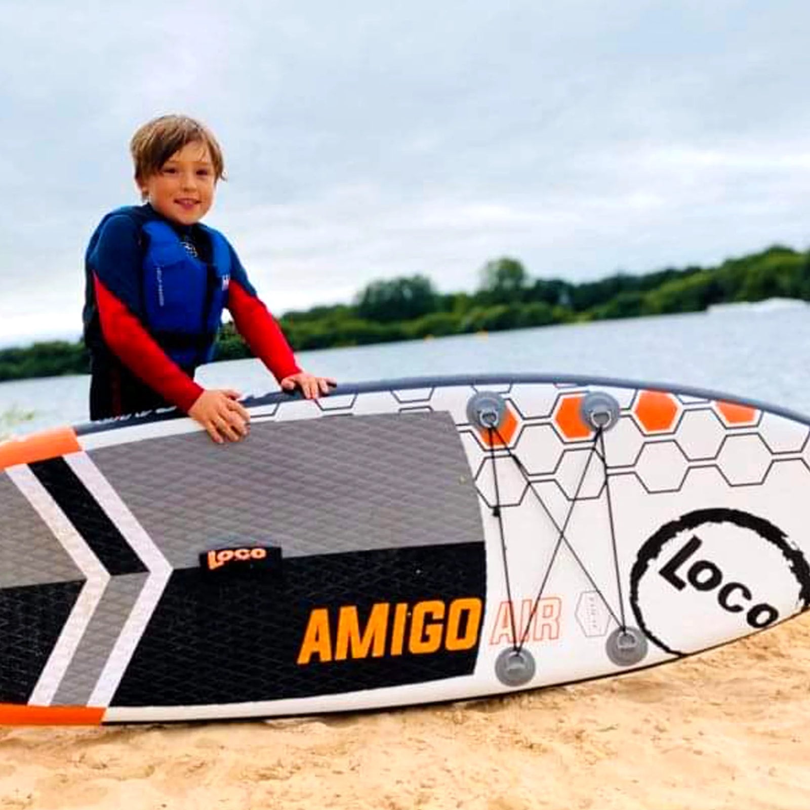 kids with his inflatable paddle board
