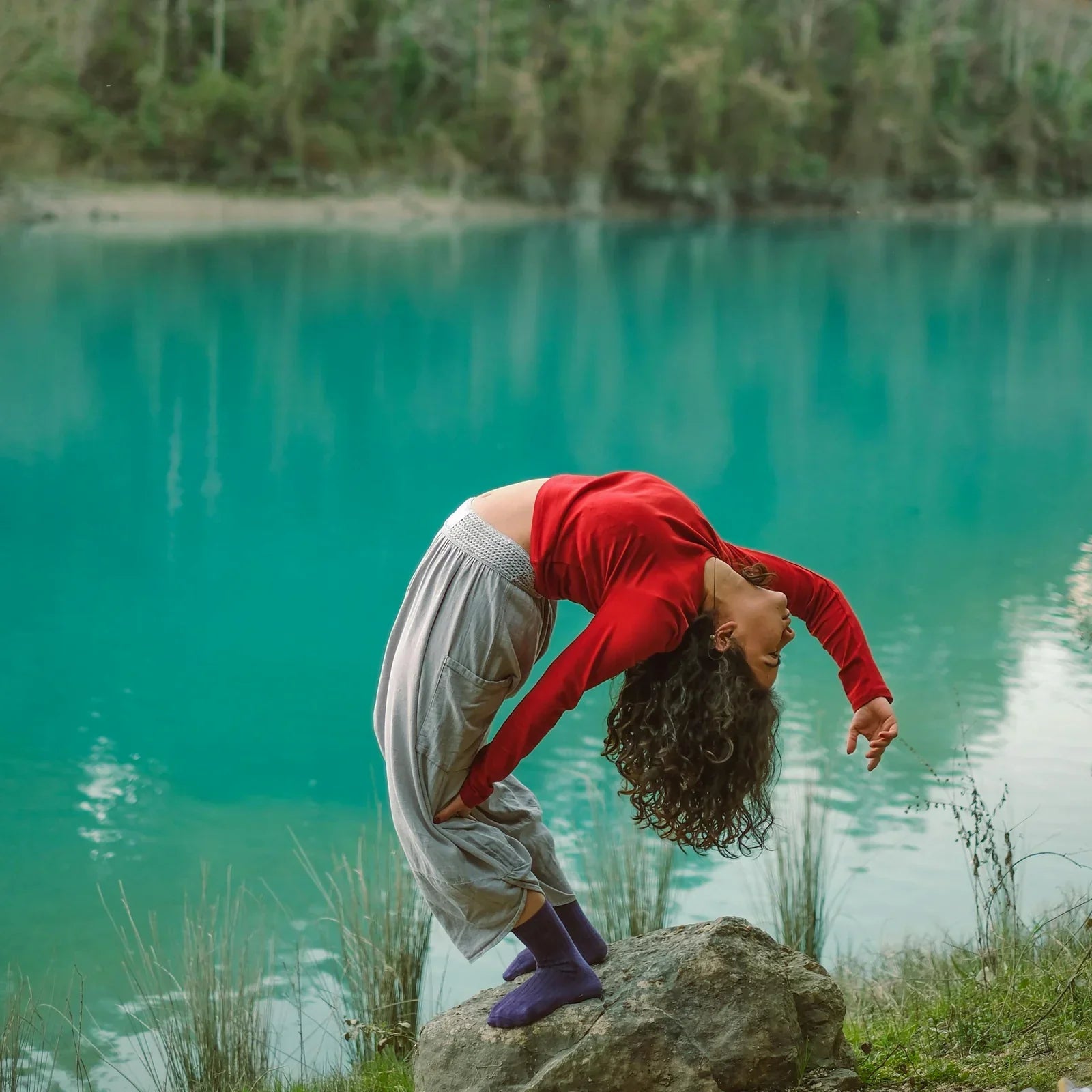 SUP Yoga Girl Next To Water 