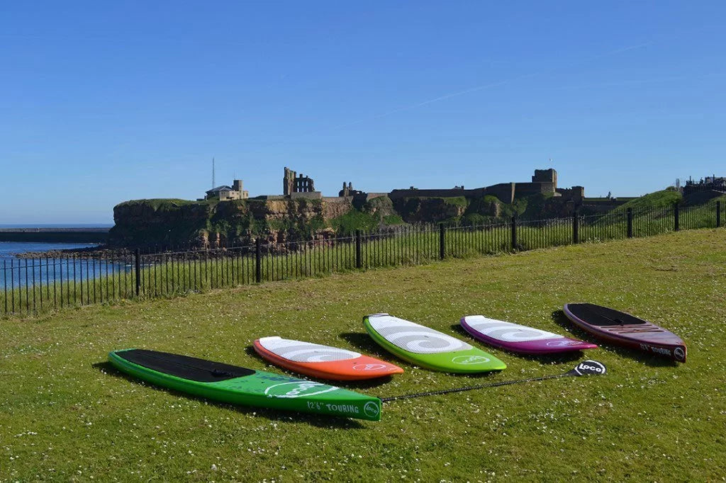 Loco SUPs with Tynemouth Priory in background