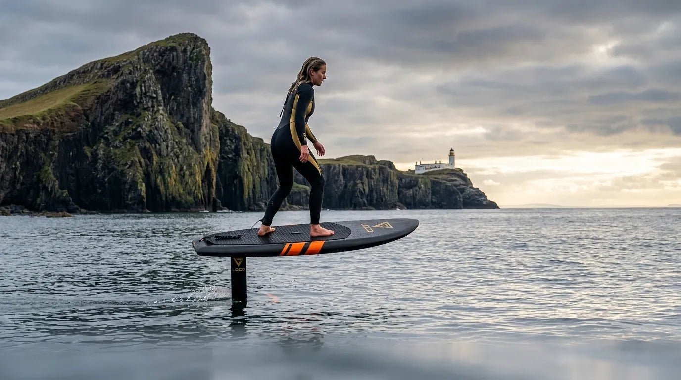 Rider on a hydrofoil SUP board lifting above the water in UK coastal conditions, 2026