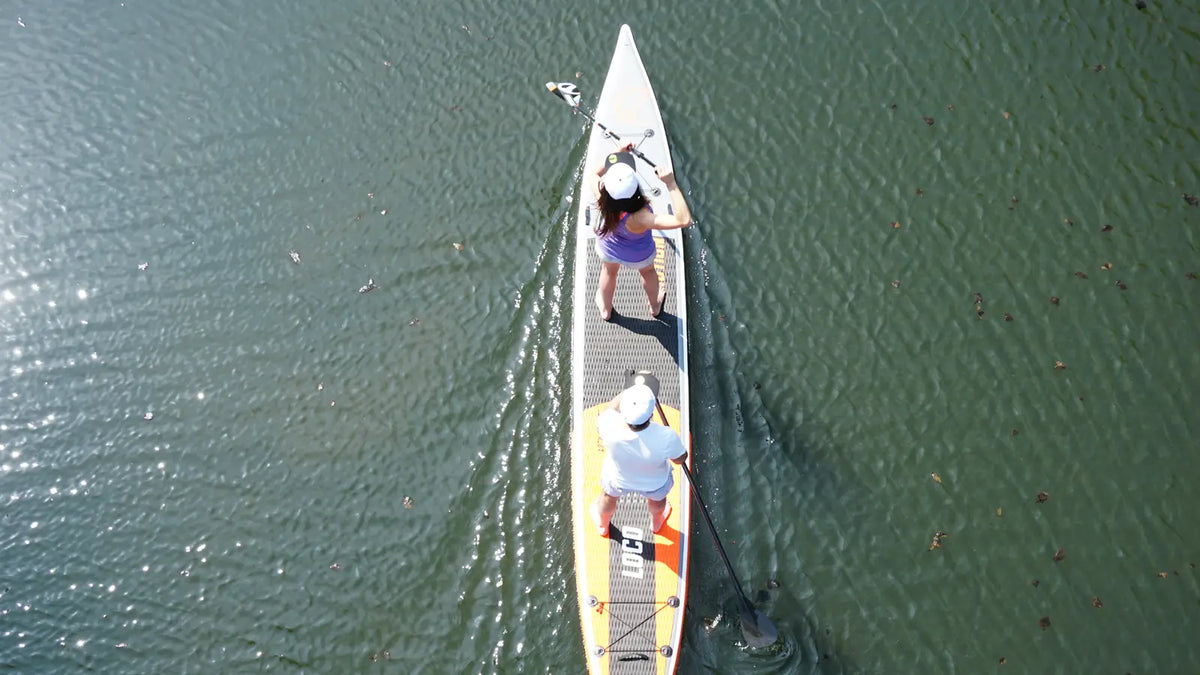 Touring vs race paddle board used for efficient distance paddling in the UK