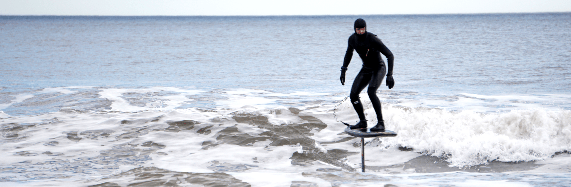Guy Riding His HydroFoil Board in the North Sea UK