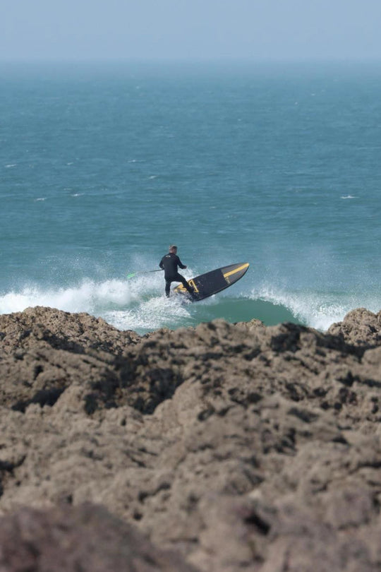 Atmospheric paddle surfing shot from Loco Surfing