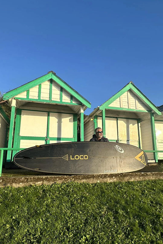 longboard paddleboard basking in Welsh sunshine