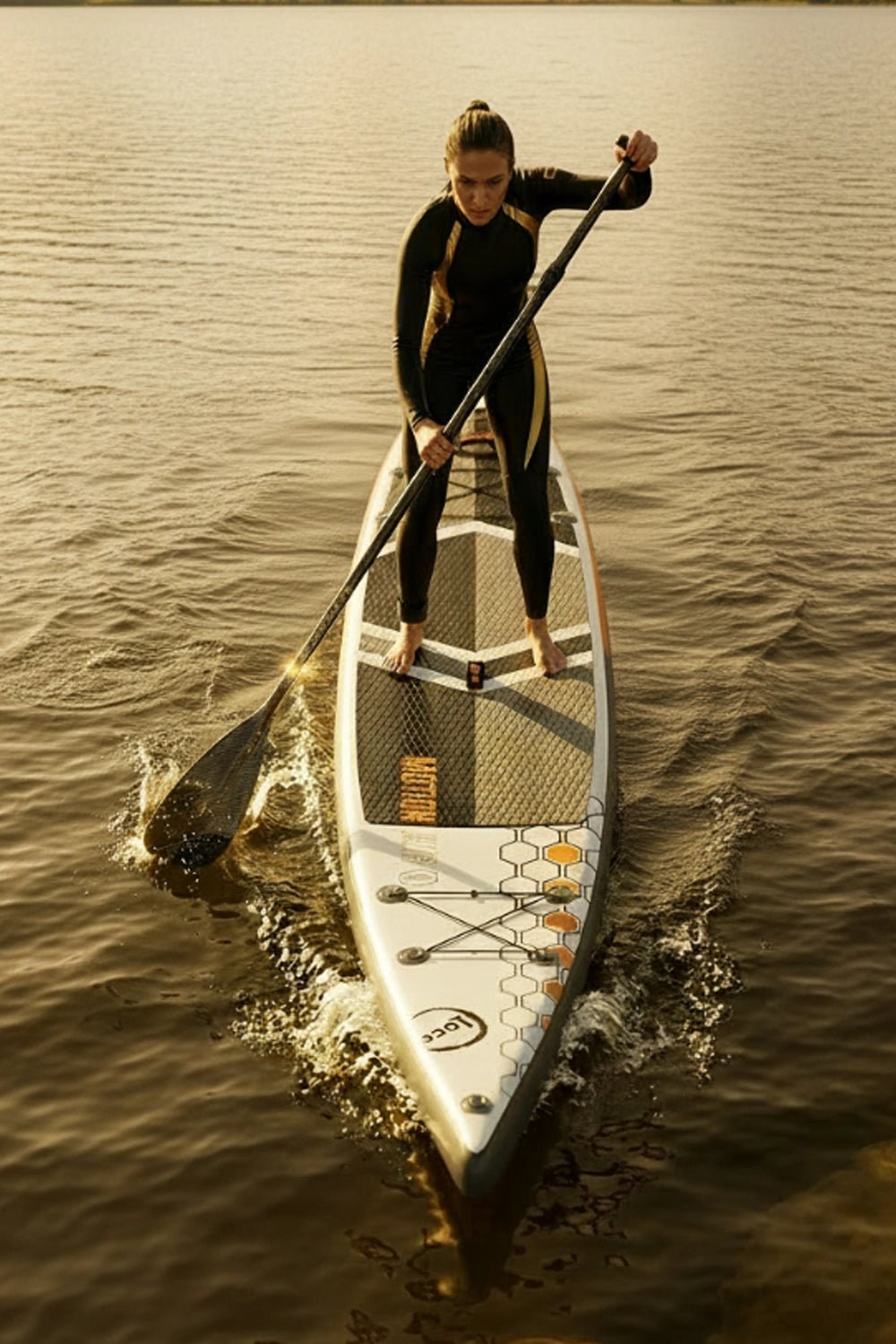 SUP racer woman training for speed on her Loco board