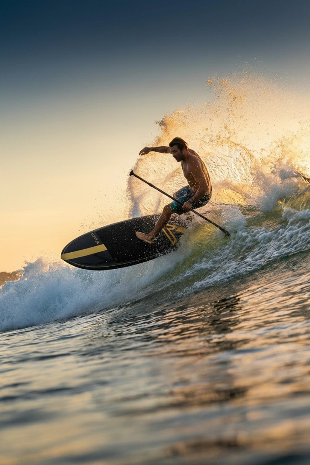 Pro paddleboarding on a wave with a sunset in the background